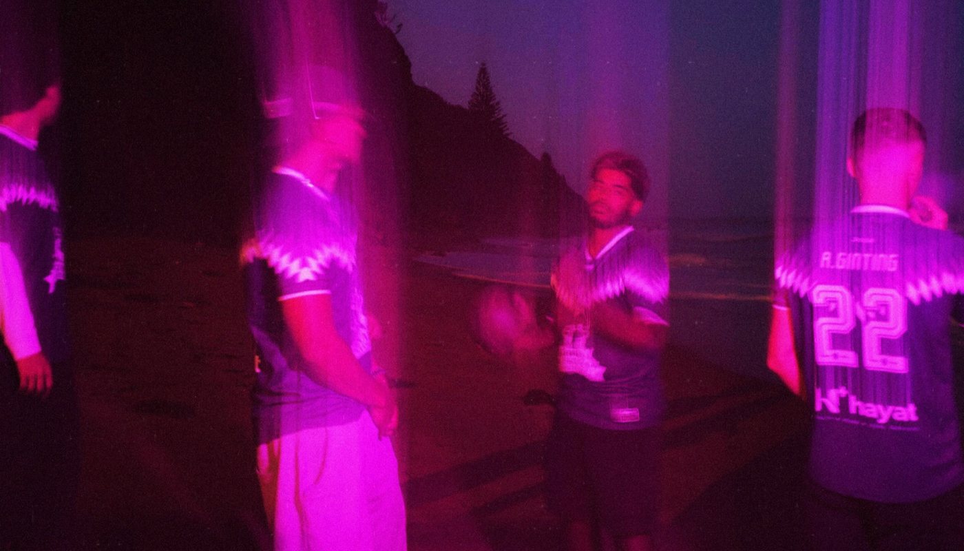 The home kit on the beach at night under coloured light